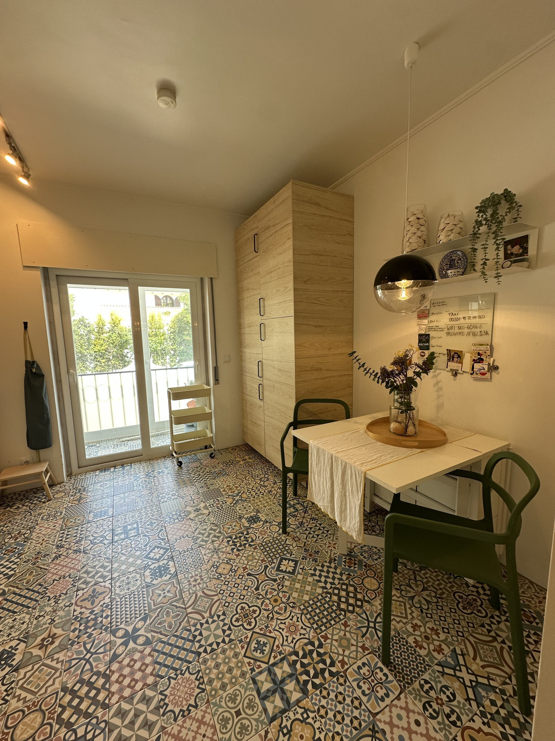 Kitchen with patterned tile floor