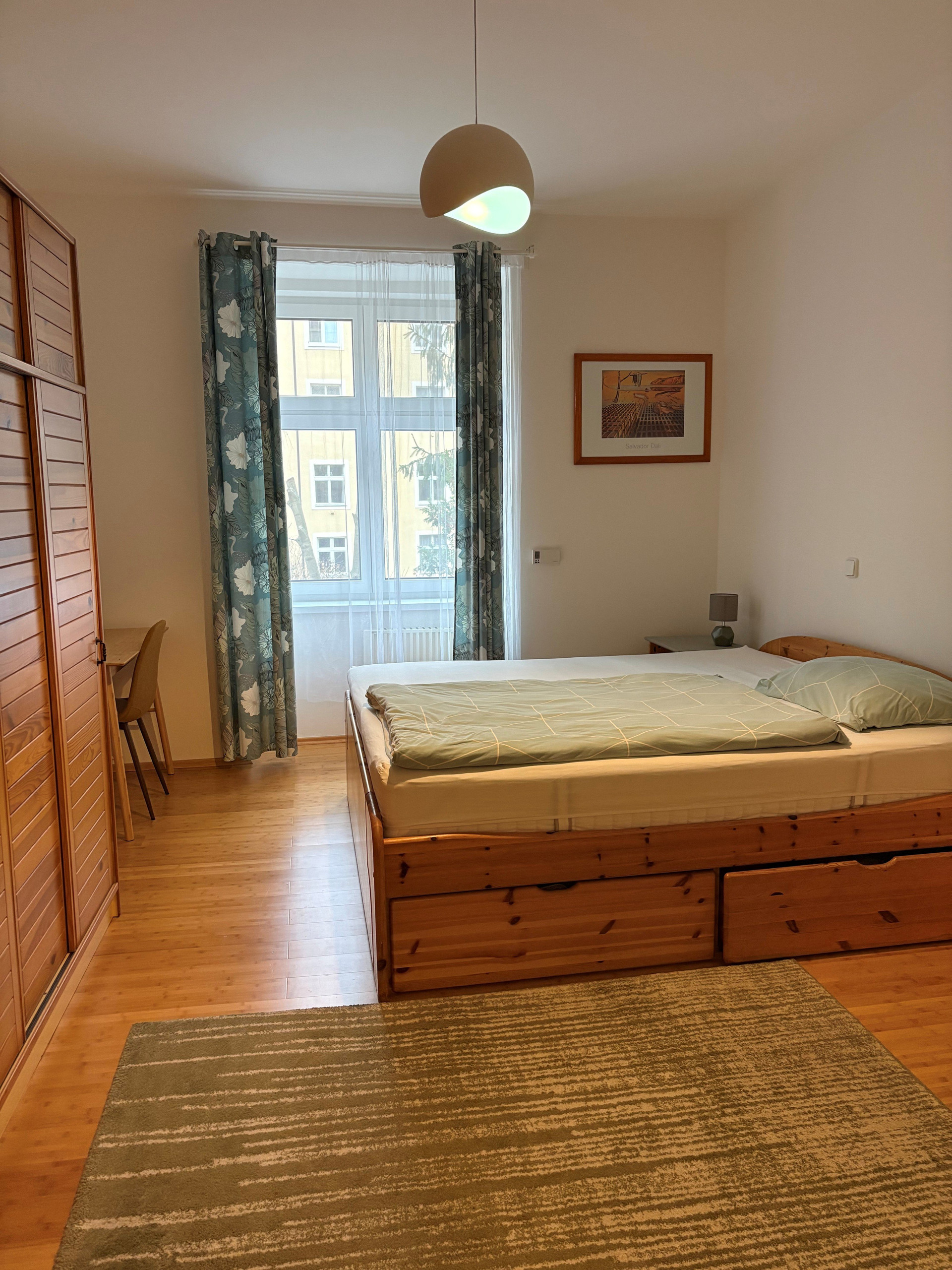 Bedroom with wooden bed