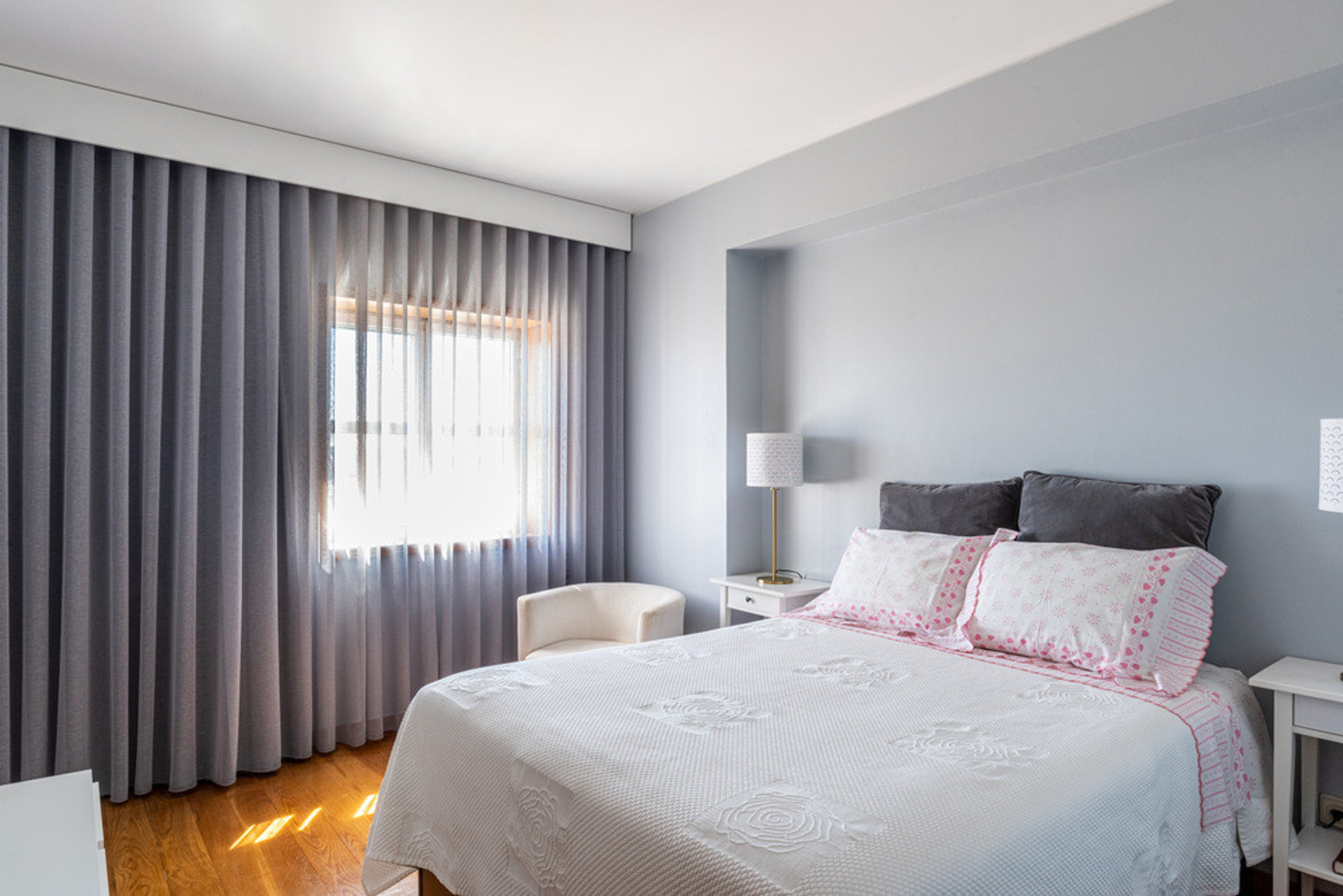 Bright bedroom with curtains