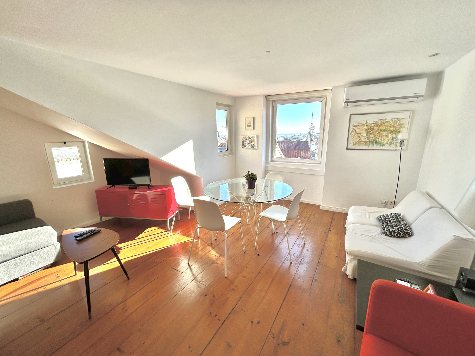 Bright living dining room city views