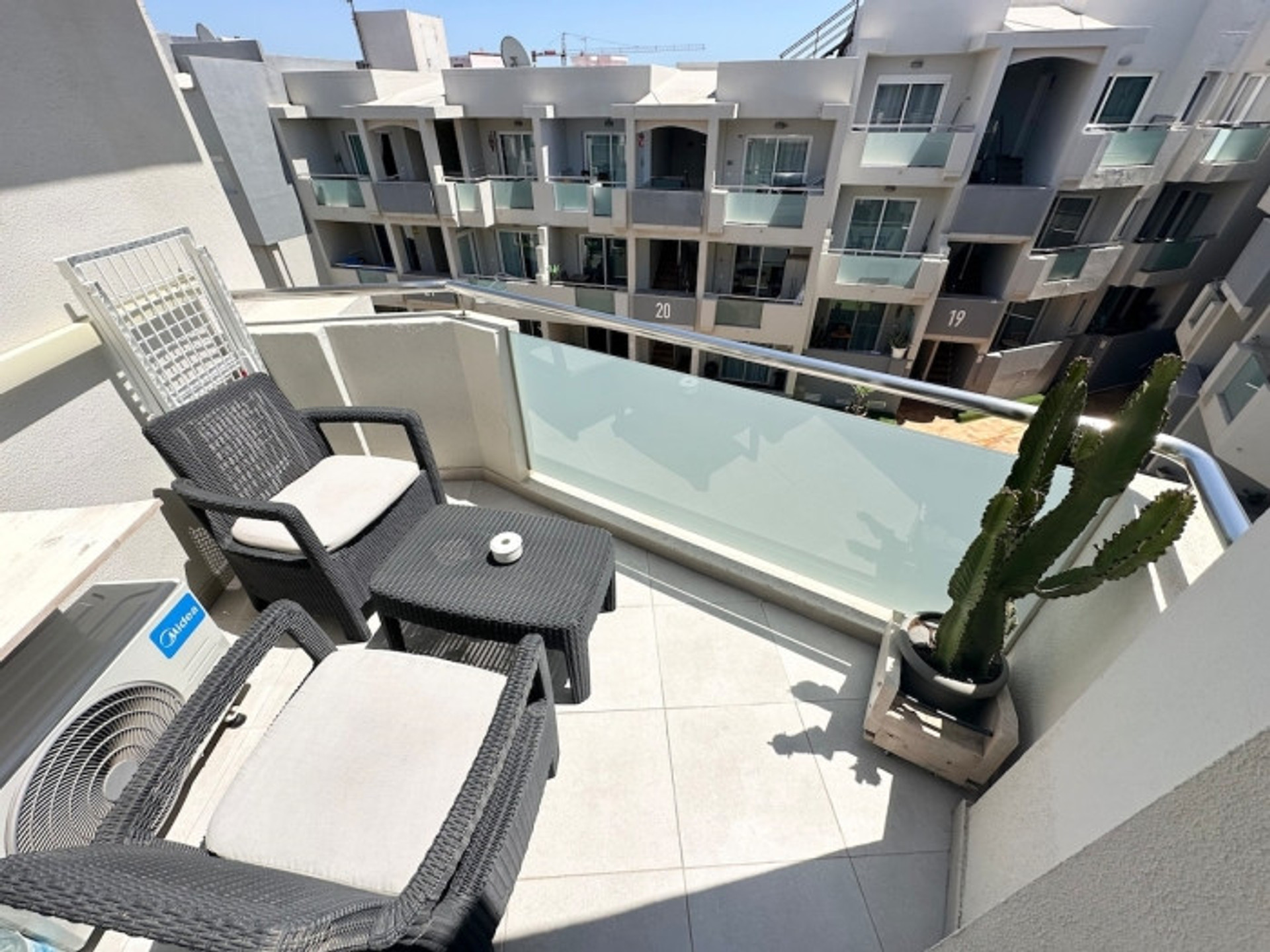 Furnished balcony with courtyard view