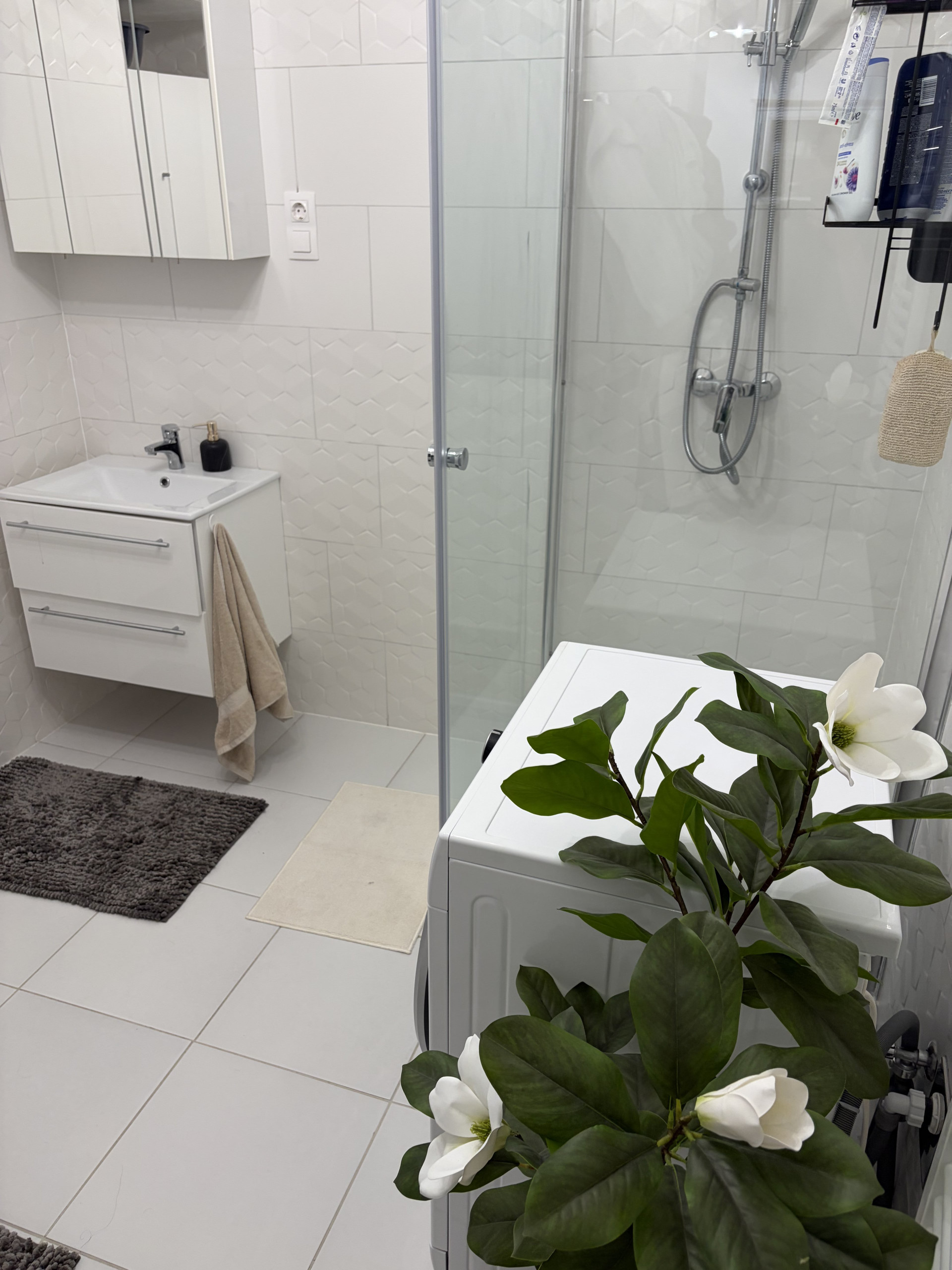 Bright bathroom with glass shower