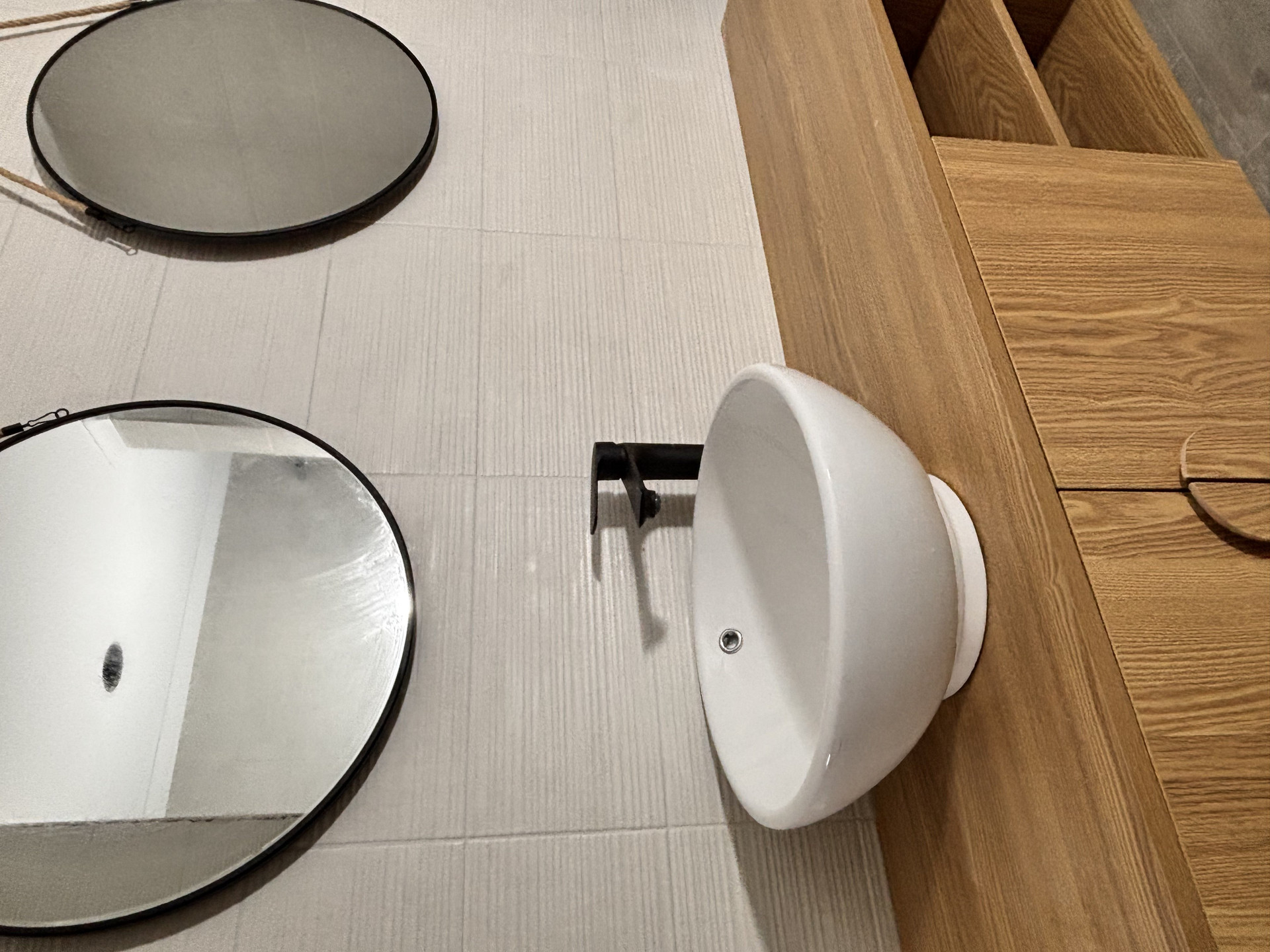 Bathroom mirrors and sink basin