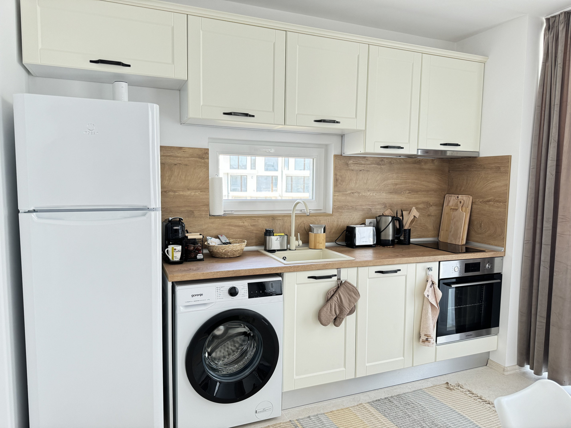 Kitchen with fridge and appliances