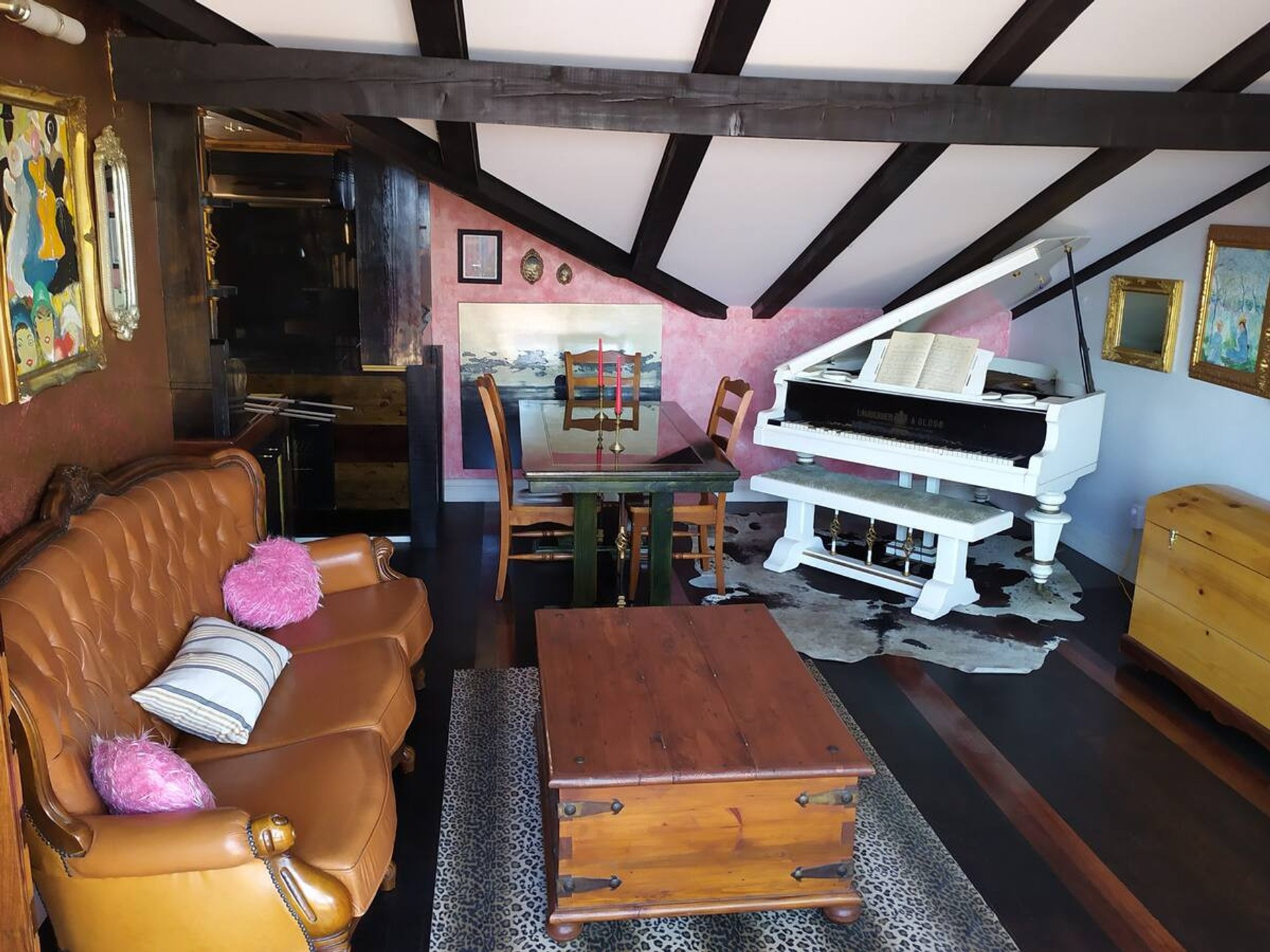 Living room with grand piano and sofa