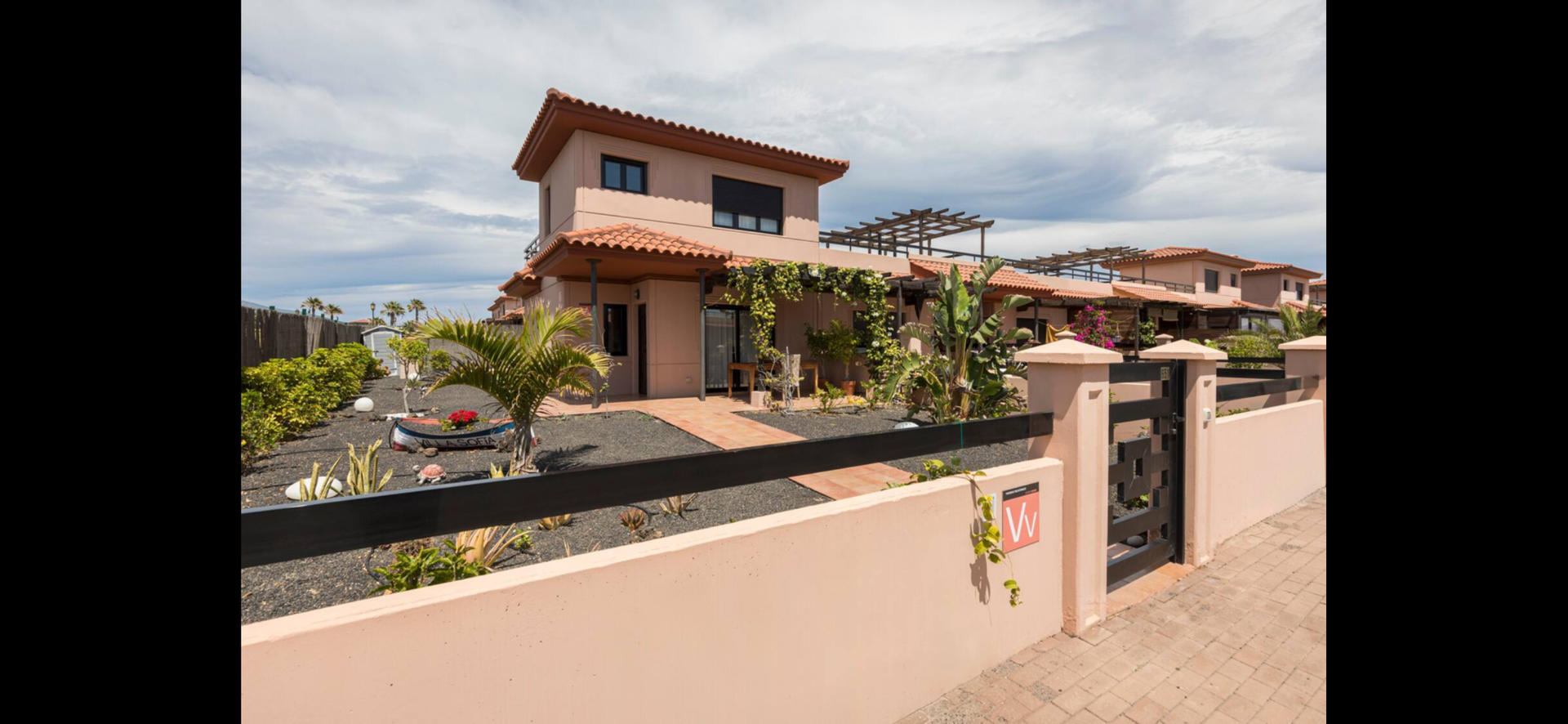 Villa exterior with garden entrance