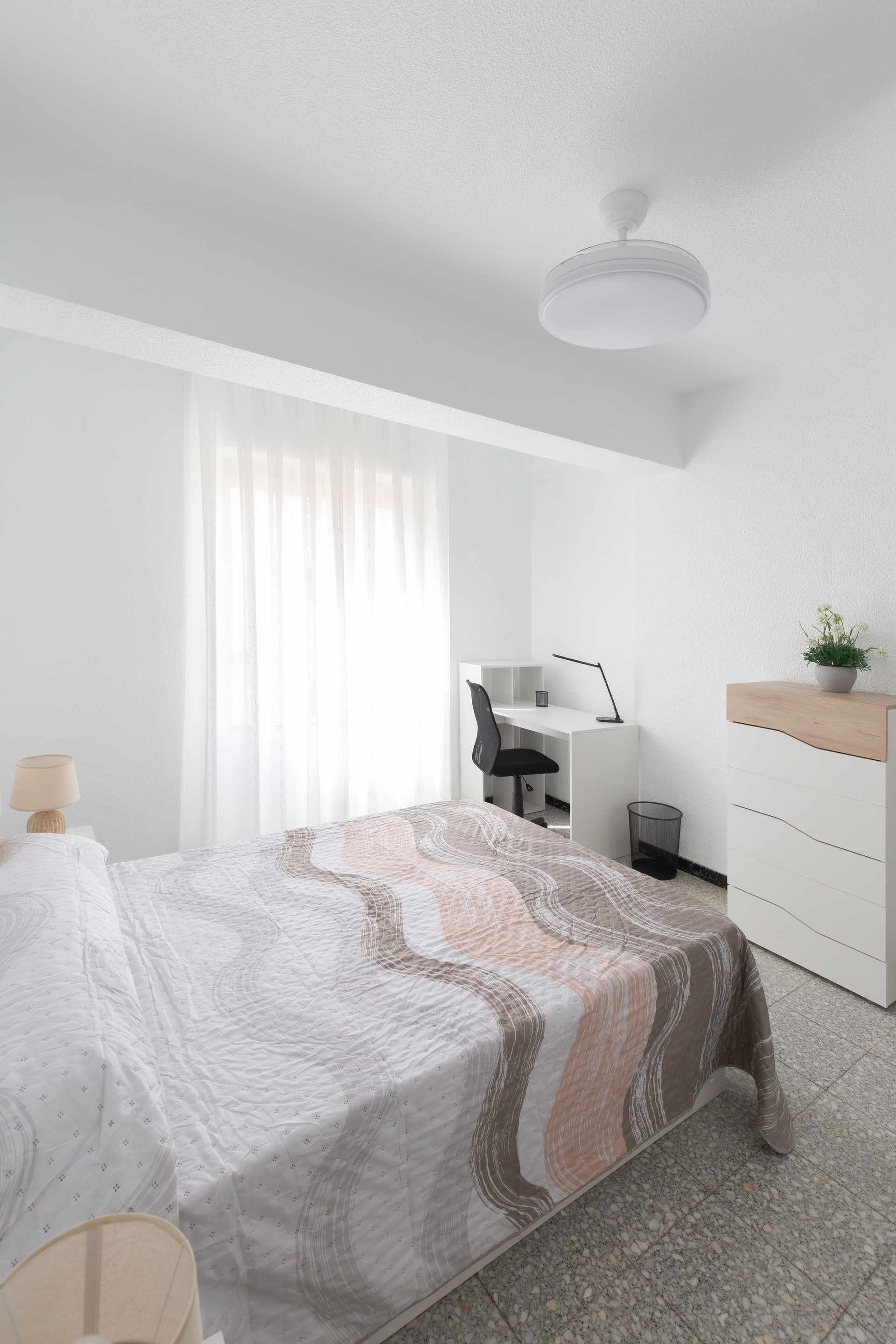 Bedroom with desk and dresser
