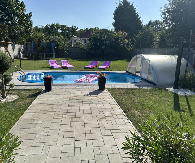 Swimming pool with loungers