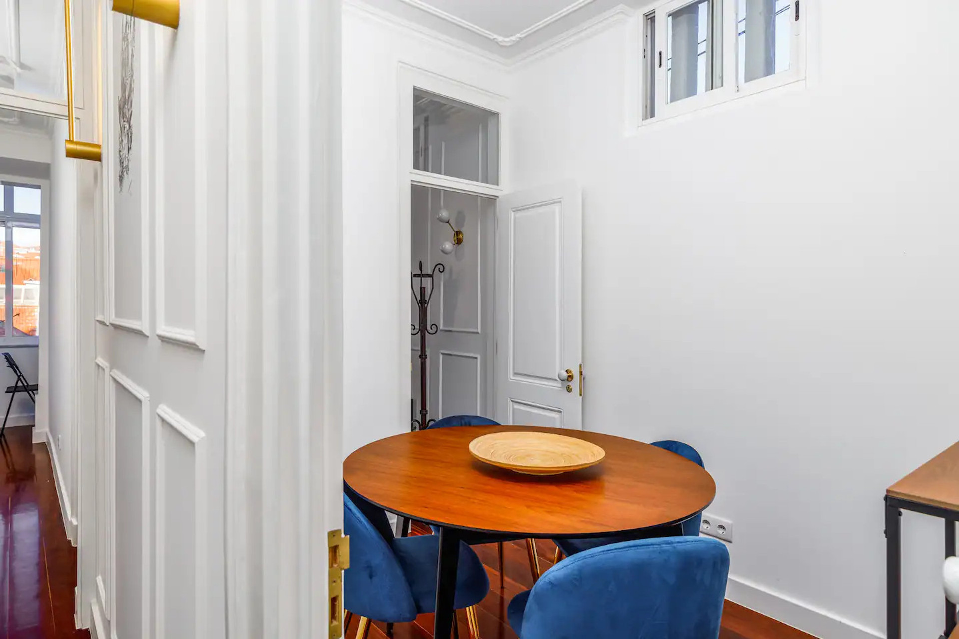 Dining area round table blue chairs