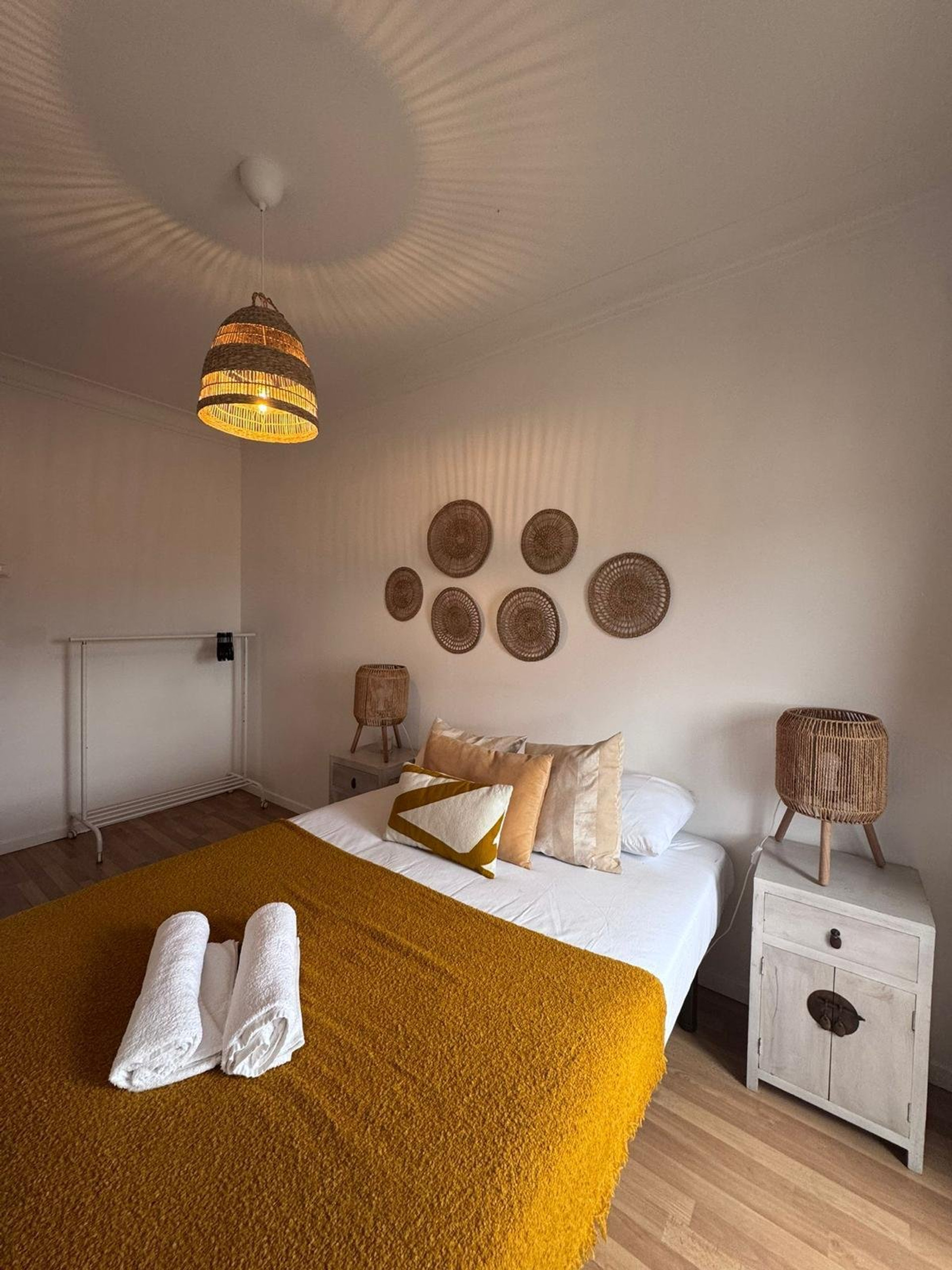Cozy bedroom with rattan decor