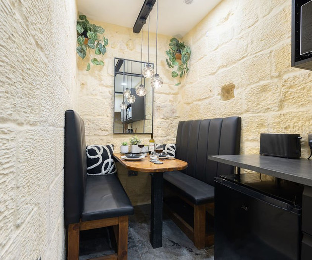 Kitchen dining booth with mirror