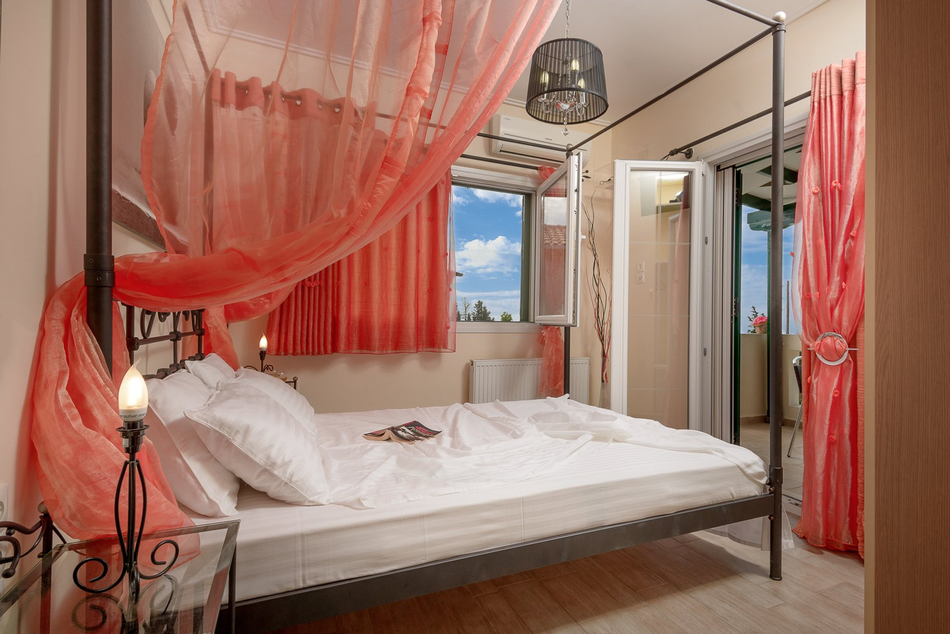 Bedroom with canopy drapes