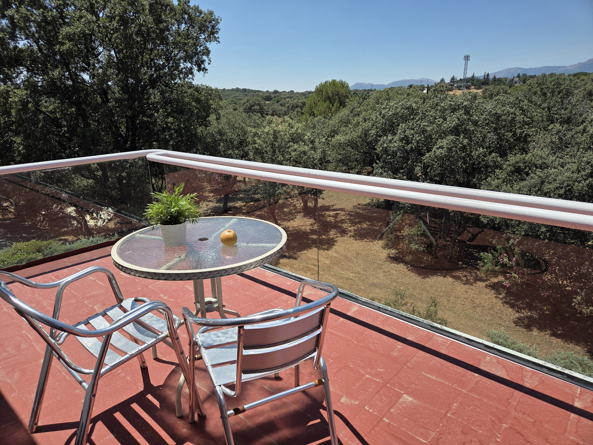 Balcony seating with mountain views