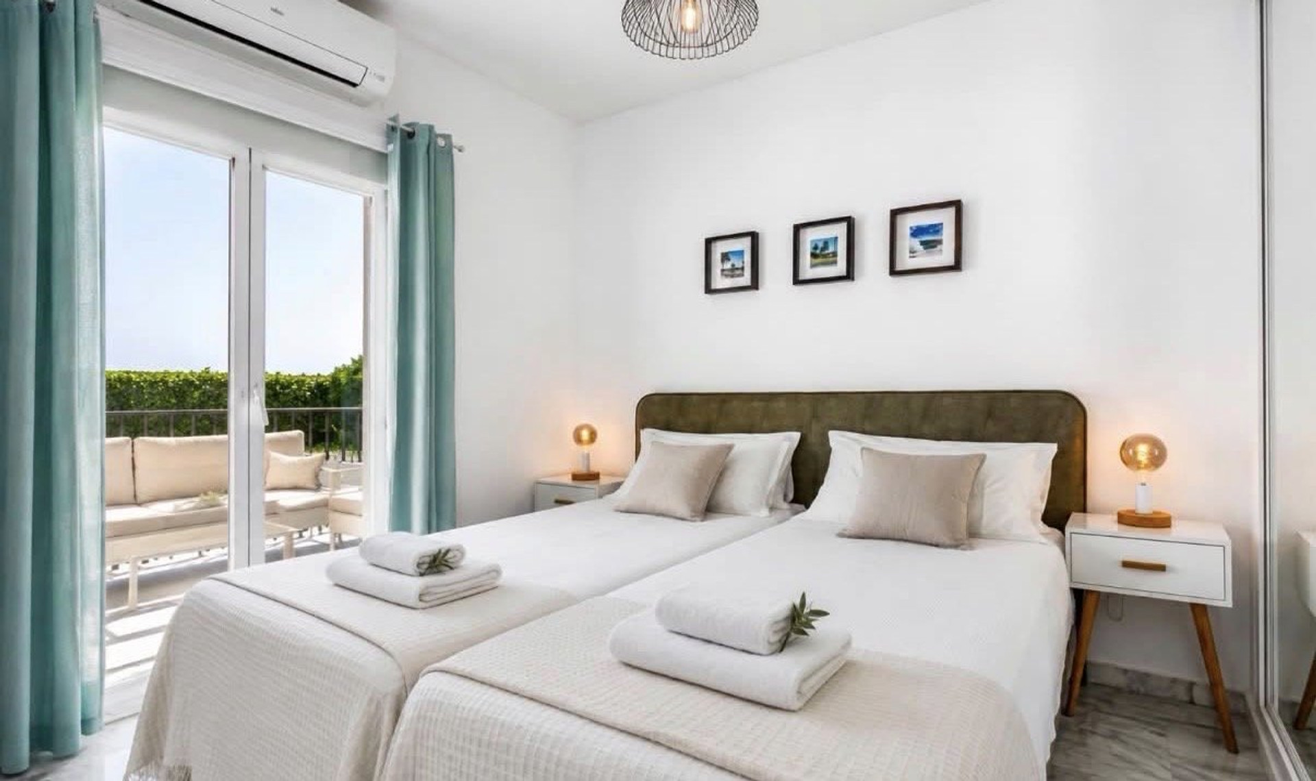 Twin bedroom with balcony access